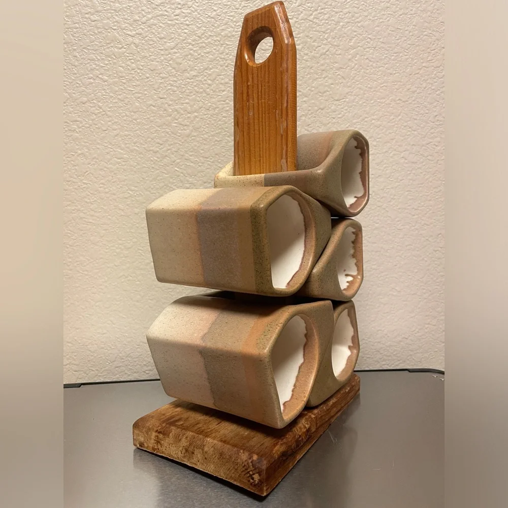 Rodolfo Padilla stacking mugs